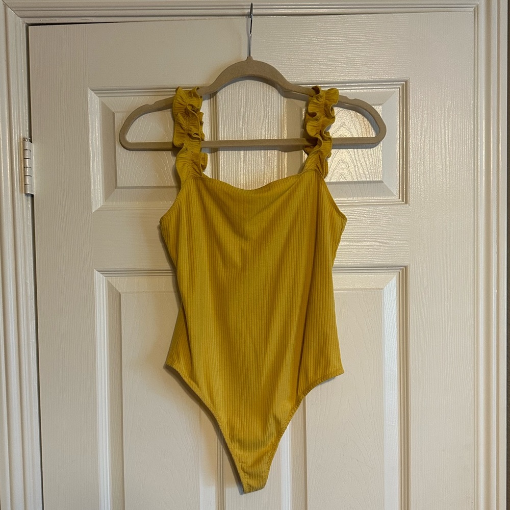 Yellow bodysuit